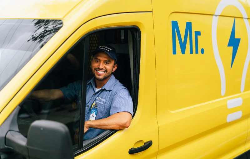 Mr. Electric electrician arriving to perform ballast replacement